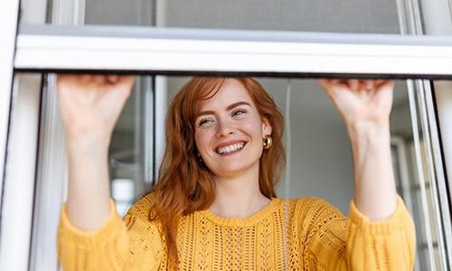 woman-hand-hold-retractable-pleated-insect-screen-holder-open-close-window-mosquito-nets